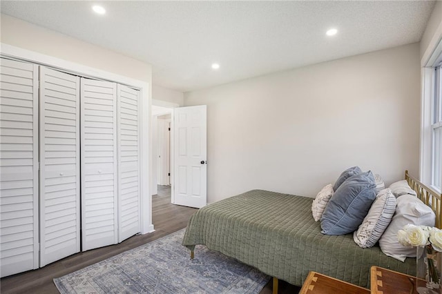 624 S Locust St, Gardner, KS 66030 - bedroom with wood finished floors, recessed lighting, and a closet