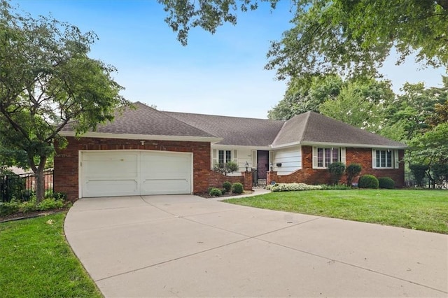 126 W 116th St, Kansas City, MO 64114 - single story home featuring an attached garage, brick siding, and concrete driveway