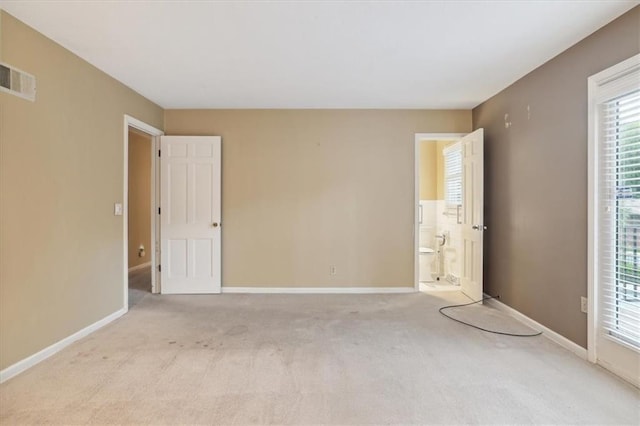 126 W 116th St, Kansas City, MO 64114 - carpeted spare room with baseboards