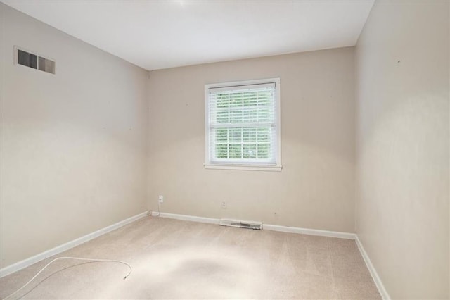 126 W 116th St, Kansas City, MO 64114 - carpeted empty room featuring baseboards