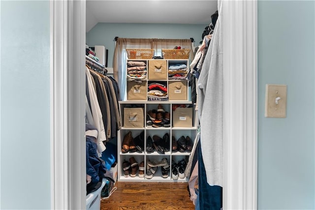 2201 SW Forestpark Cir, Lees Summit, MO 64081 - walk in closet featuring wood finished floors and vaulted ceiling