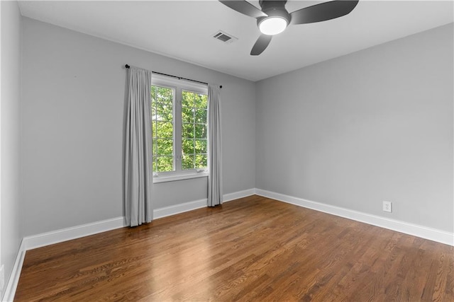 2201 SW Forestpark Cir, Lees Summit, MO 64081 - spare room featuring wood finished floors, baseboards, and a ceiling fan