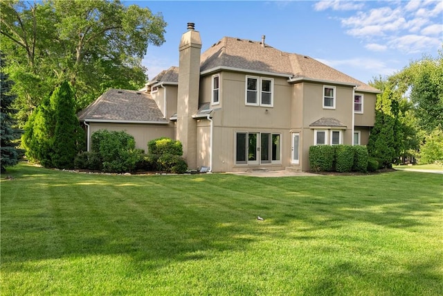 2201 SW Forestpark Cir, Lees Summit, MO 64081 - rear view of house with a chimney, a yard, a patio, and a shingled roof
