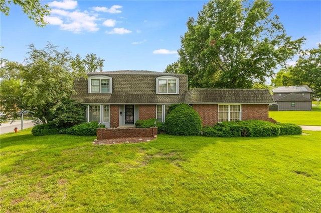 9714 Shepherds Dr, Kansas City, MO 64131 - colonial inspired home with mansard roof, roof with shingles, brick siding, and a front lawn