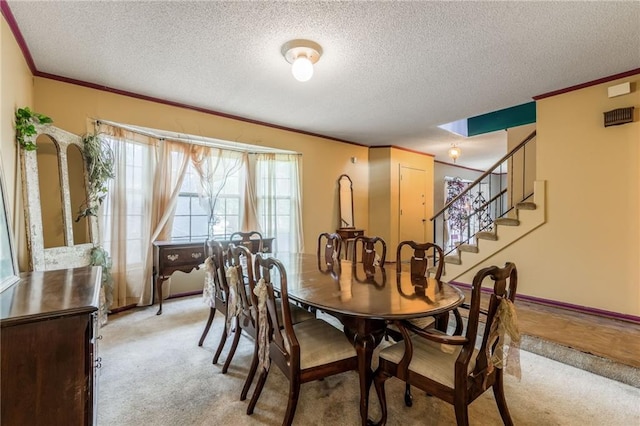 9714 Shepherds Dr, Kansas City, MO 64131 - dining room with light carpet, ornamental molding, a textured ceiling, and stairs