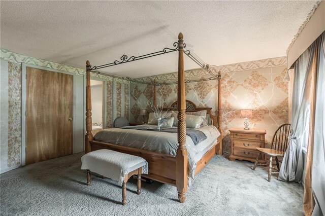 9714 Shepherds Dr, Kansas City, MO 64131 - bedroom featuring wallpapered walls, a textured ceiling, and carpet