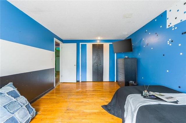 9714 Shepherds Dr, Kansas City, MO 64131 - bedroom with wood finished floors and a closet