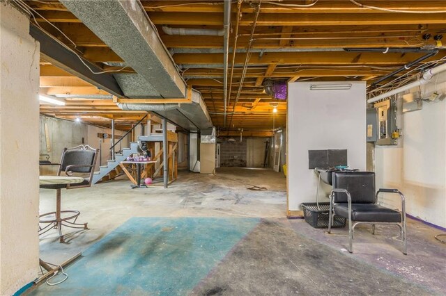 9714 Shepherds Dr, Kansas City, MO 64131 - unfinished below grade area featuring stairs