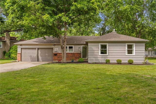 10417 Outlook Dr, Overland Park, KS 66207 - single story home with an attached garage, driveway, a front lawn, and brick siding