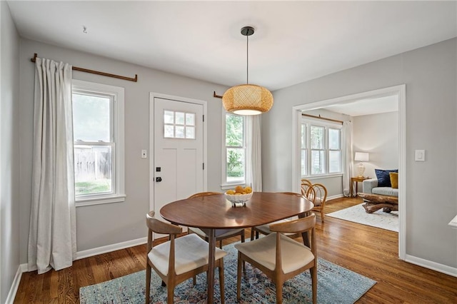 10417 Outlook Dr, Overland Park, KS 66207 - dining space with plenty of natural light and wood finished floors