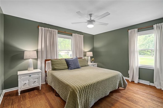 10417 Outlook Dr, Overland Park, KS 66207 - bedroom featuring wood finished floors and ceiling fan