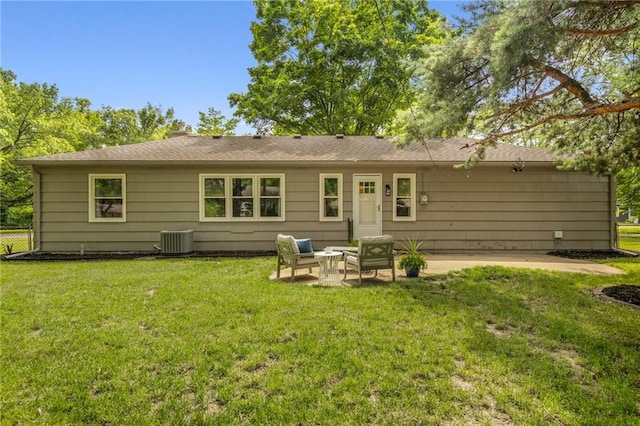 10417 Outlook Dr, Overland Park, KS 66207 - rear view of house with a patio and a yard