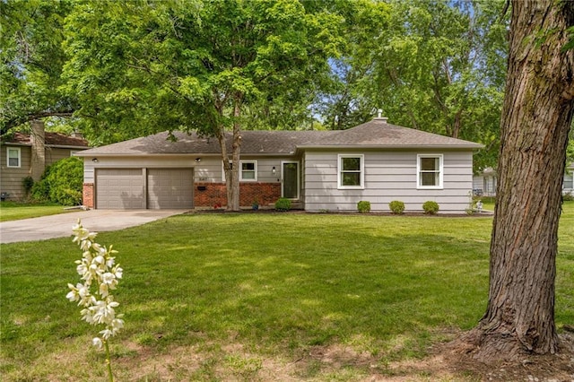 10417 Outlook Dr, Overland Park, KS 66207 - ranch-style house featuring a garage, concrete driveway, and a front lawn