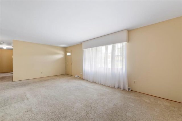 5029 NE 58th St, Kansas City, MO 64119 - empty room featuring carpet floors