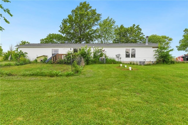 46005 E State Route N, Creighton, MO 64739 - back of house with a lawn, a wooden deck, and cooling unit