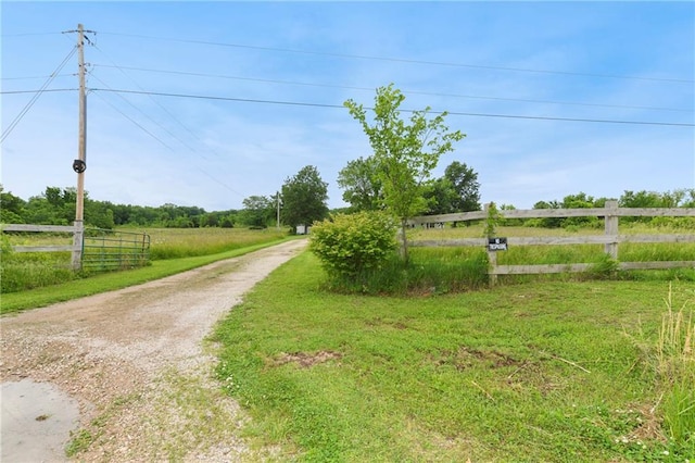 46005 E State Route N, Creighton, MO 64739 - view of dirt / gravel road with a view of countryside