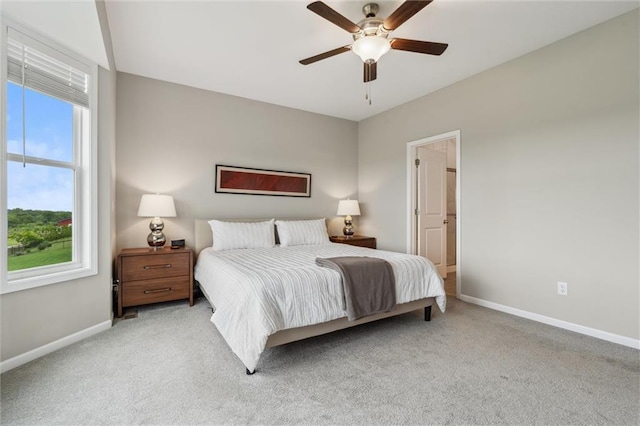 9504 N Amoret Ave, Kansas City, MO 64154 - carpeted bedroom featuring baseboards and ceiling fan