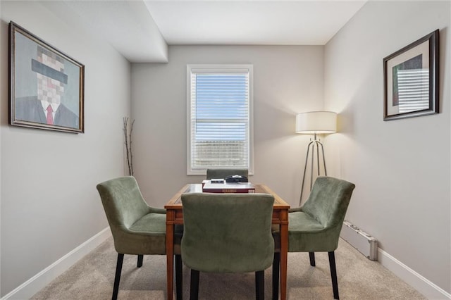 9504 N Amoret Ave, Kansas City, MO 64154 - dining area featuring carpet flooring, baseboards, and an office area