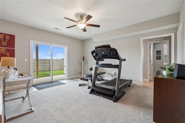 9504 N Amoret Ave, Kansas City, MO 64154 - exercise area with a ceiling fan, baseboards, and carpet flooring