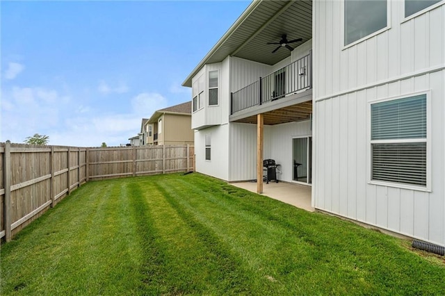 9504 N Amoret Ave, Kansas City, MO 64154 - view of yard with a balcony, ceiling fan, and a patio