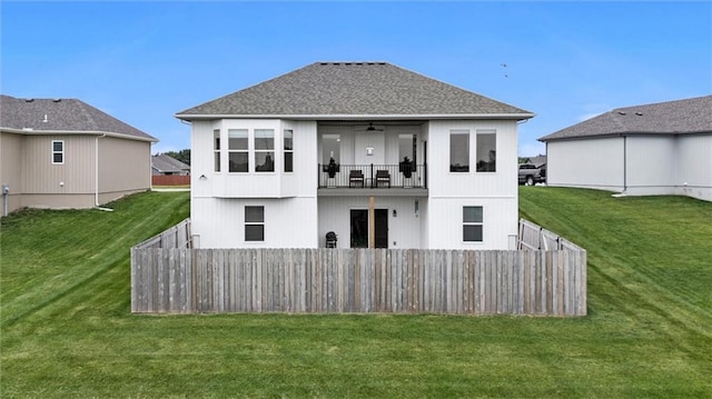 9504 N Amoret Ave, Kansas City, MO 64154 - back of property with a balcony, ceiling fan, and a shingled roof