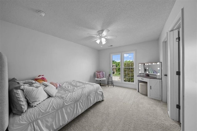 17631 S Brockway St, Olathe, KS 66062 - bedroom featuring carpet, a textured ceiling, and a ceiling fan