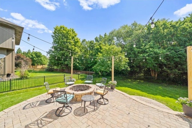 17631 S Brockway St, Olathe, KS 66062 - fenced backyard featuring an outdoor fire pit, a patio, and view of wooded area