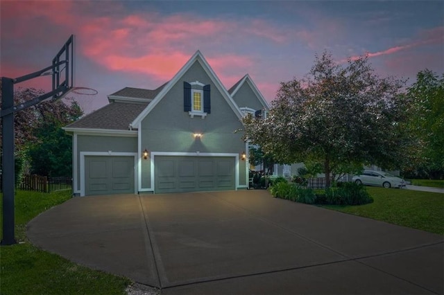17631 S Brockway St, Olathe, KS 66062 - traditional-style house with concrete driveway, stucco siding, and a garage