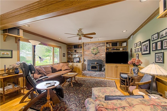 301 W 109th St, Kansas City, MO 64114 - living area featuring wood finished floors, ceiling fan, ornamental molding, recessed lighting, and built in shelves