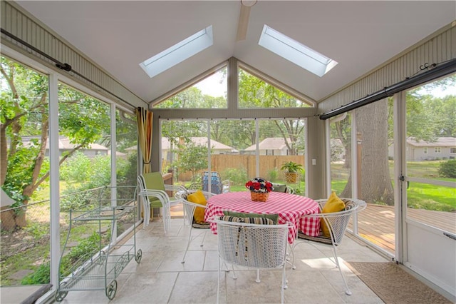 301 W 109th St, Kansas City, MO 64114 - sunroom / solarium with a skylight, vaulted ceiling, and outdoor dining space