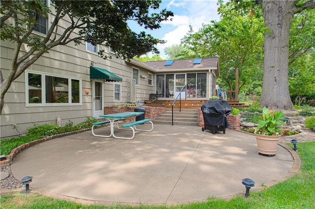 301 W 109th St, Kansas City, MO 64114 - view of patio with a sunroom and area for grilling