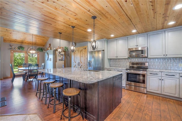 210 SE 200th Rd, Clinton, MO 64735 - kitchen with stainless steel appliances, wooden ceiling, dark wood-style floors, tasteful backsplash, and a kitchen island