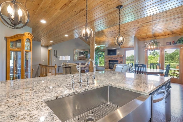 210 SE 200th Rd, Clinton, MO 64735 - kitchen featuring a sink, a chandelier, wooden ceiling, open floor plan, and a brick fireplace