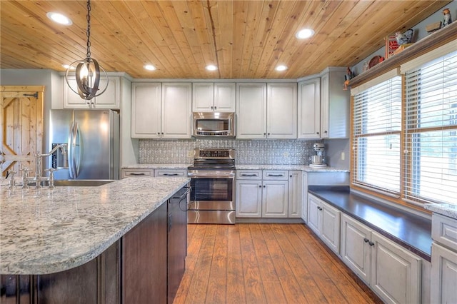 210 SE 200th Rd, Clinton, MO 64735 - kitchen featuring appliances with stainless steel finishes, wood ceiling, dark wood finished floors, a sink, and recessed lighting
