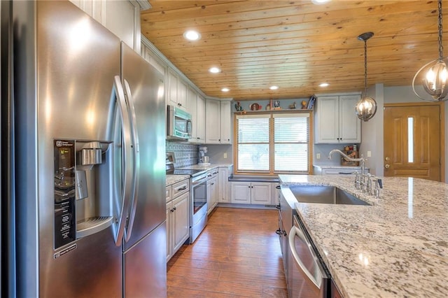 210 SE 200th Rd, Clinton, MO 64735 - kitchen featuring stainless steel appliances, wood ceiling, dark wood-type flooring, recessed lighting, and decorative light fixtures