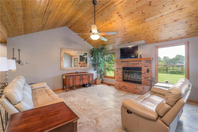 210 SE 200th Rd, Clinton, MO 64735 - living room featuring vaulted ceiling, wooden ceiling, a ceiling fan, a fireplace, and healthy amount of natural light