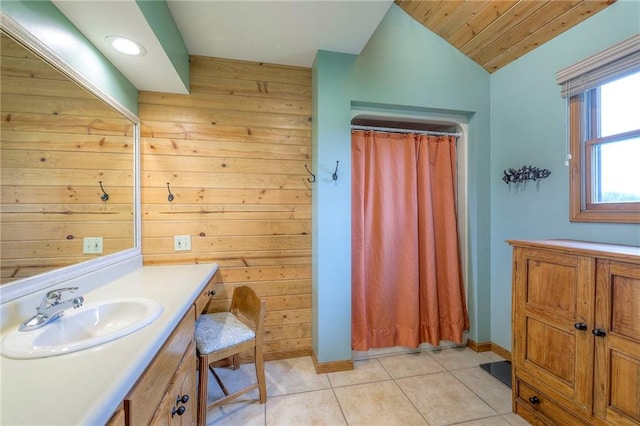 210 SE 200th Rd, Clinton, MO 64735 - bathroom with wooden walls, vanity, baseboards, a shower with curtain, and lofted ceiling