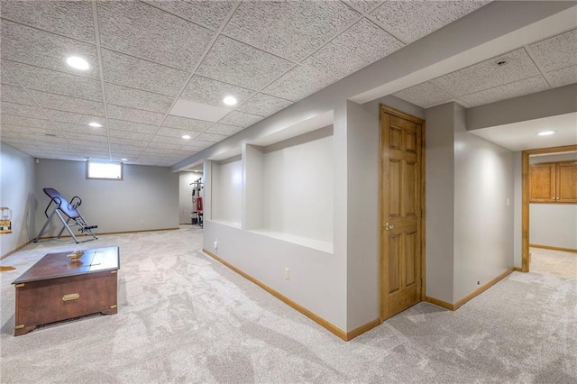 210 SE 200th Rd, Clinton, MO 64735 - below grade area featuring a paneled ceiling, carpet, recessed lighting, and baseboards