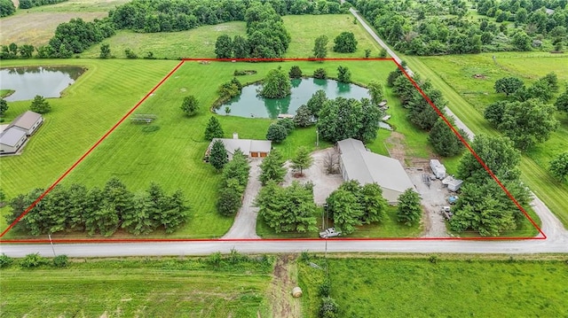 210 SE 200th Rd, Clinton, MO 64735 - aerial view of sparsely populated area with a large body of water and property boundaries highlighted