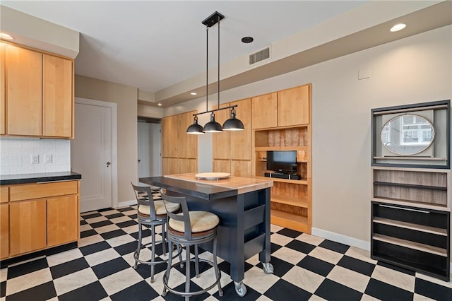 4618 Warwick Blvd Unit 6C, Kansas City, MO 64112 - kitchen featuring light floors, light brown cabinets, open shelves, dark countertops, and recessed lighting