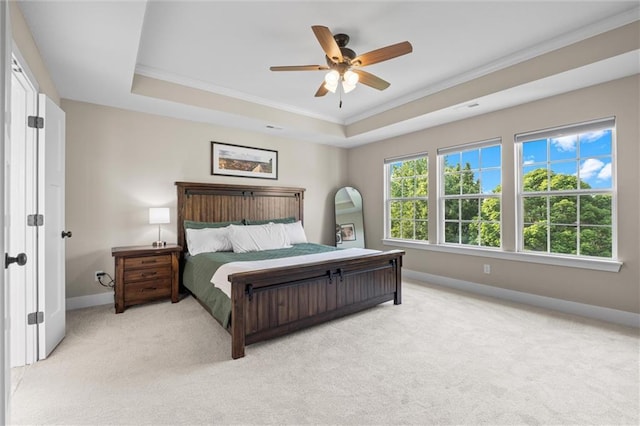 20711 W 49th St, Shawnee, KS 66218 - bedroom featuring a raised ceiling, baseboards, crown molding, light colored carpet, and ceiling fan
