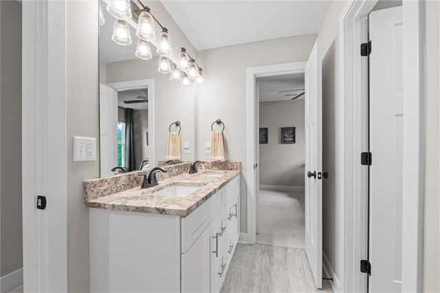 20711 W 49th St, Shawnee, KS 66218 - full bath featuring double vanity and baseboards