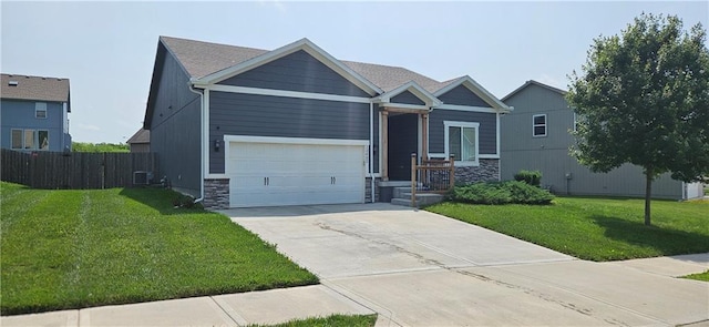 12432 Live Oak Cir, Peculiar, MO 64078 - craftsman-style house with concrete driveway, stone siding, and central AC unit