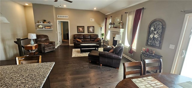 12432 Live Oak Cir, Peculiar, MO 64078 - living room with dark wood-type flooring, a ceiling fan, baseboards, lofted ceiling, and a fireplace