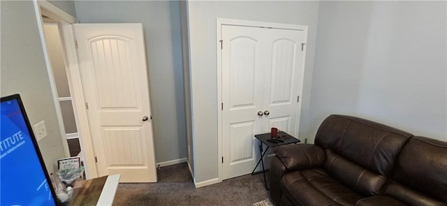 12432 Live Oak Cir, Peculiar, MO 64078 - living area featuring dark colored carpet