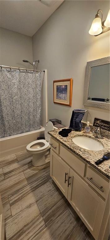 12432 Live Oak Cir, Peculiar, MO 64078 - full bath featuring shower / bath combination with curtain, vanity, toilet, and wood finished floors