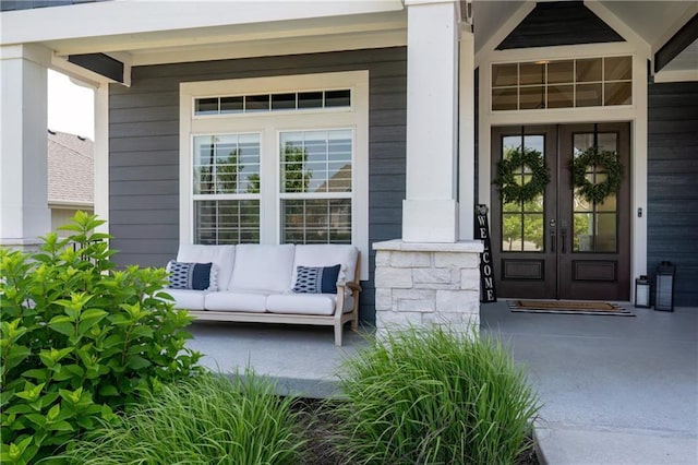9291 Brownridge St, Lenexa, KS 66220 - property entrance with french doors and covered porch