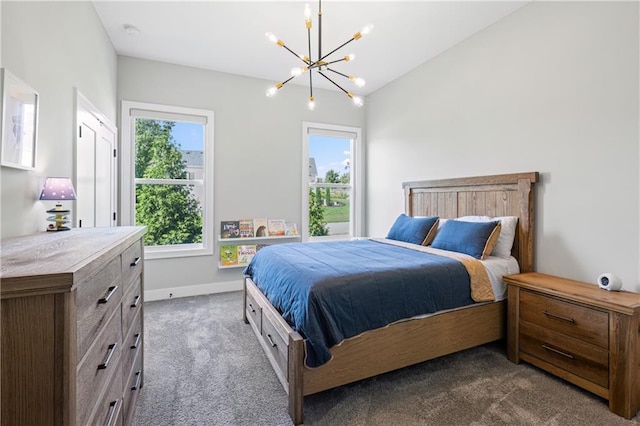 9291 Brownridge St, Lenexa, KS 66220 - carpeted bedroom featuring a chandelier and vaulted ceiling