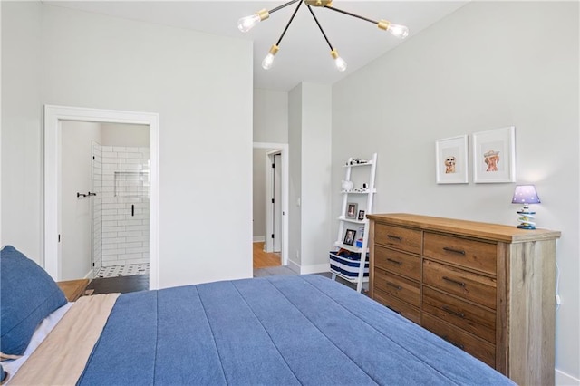 9291 Brownridge St, Lenexa, KS 66220 - bedroom with a chandelier and connected bathroom