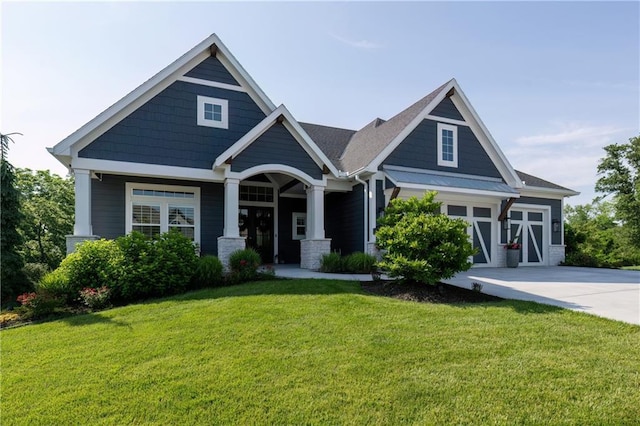 9291 Brownridge St, Lenexa, KS 66220 - craftsman-style home featuring a front lawn and concrete driveway